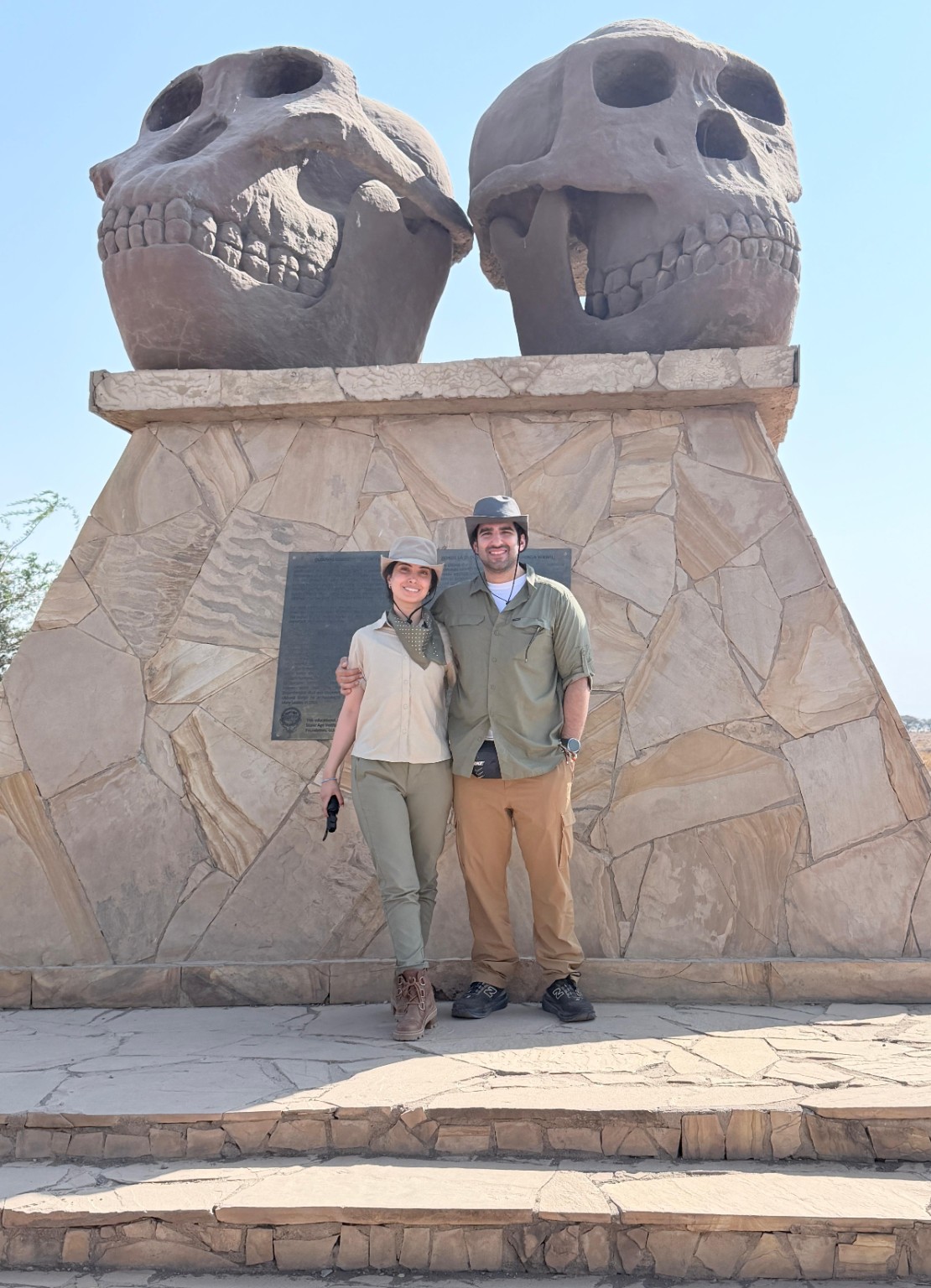 Honeymoon couple at the Olduvai Gorge monument